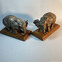 Both elephant bookends side by side showing overall design and condition