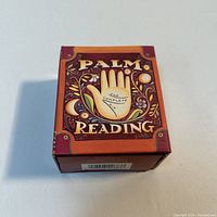 Front view of boxed Palm Reading kit