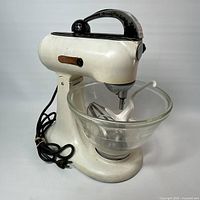 Full view of stand mixer with bowl and beater attached