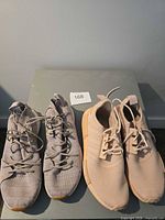 Top view of both sneaker pairs
