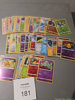 Overview of all 49 holographic and reverse holographic Pokémon cards spread out