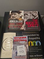 All five books laid out showing covers