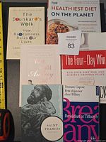 All six books laid out showing covers