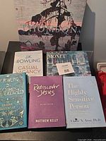 All six books displayed front covers visible