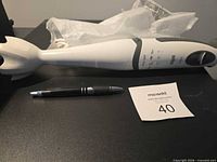 Side view of Braun immersion blender showing entire body and motor housing