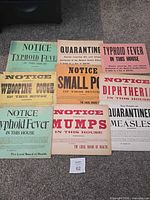 All nine placards laid out showing titles and colors