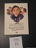 Front view of the Malcolm in the Middle Season 1 DVD set with cast artwork