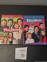 Front view of both Full House Season 3 and Season 4 DVD box sets side by side