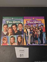 Front view of two Full House DVD box sets Season 7 and 8