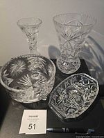 Group shot of all four matching cut crystal pieces