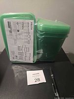 Front view of sealed IKEA Pruta container set with information sheet visible