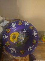 Top view of purple Halloween bowl showing full design