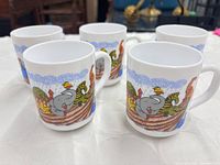 Five Noah's Ark milk glass mugs front view
