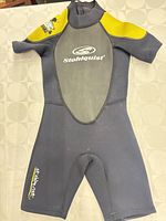 Front view of Stohlquist kids shorty wetsuit