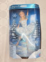 Front view of boxed Barbie Snowflake doll