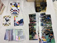 Overview of assorted Upper Deck cards: Gretzky inserts, Ice stack, Crosby base and other mixed cards