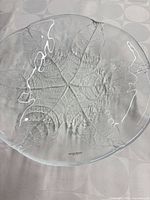 Top view of crystal plate showing full leaf embossing