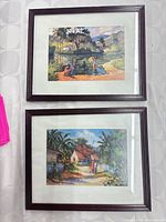 Both framed prints side by side showing size and matching frames