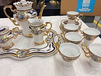 Full tea set laid out on table