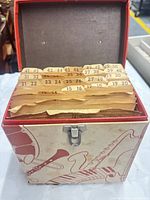 open record case showing numbered dividers