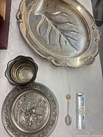 Overall view showing tray, bowls, plate, spoon and cased spoon
