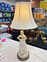 Entire lamp with shade visible