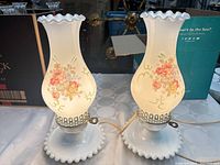 Both hurricane lamps side by side showing overall design
