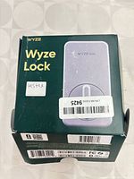 Sealed retail box front showing Wyze Lock branding