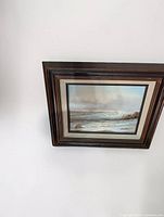 Front view of framed seascape print