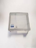 Top view of Simply Tidy clear plastic storage case showing hinged snap lid and factory label