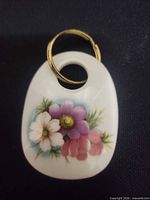 Front view showing floral decal and overall shape