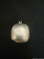 plain back view of pendant