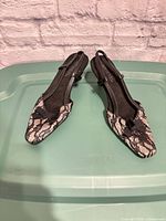 Top view of Aerosoles slingback heels showing lace pattern and bow accent