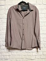 Front view of Haggar burgundy micro-check long-sleeve shirt on hanger