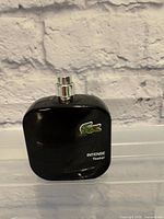 Front view showing Lacoste logo and INTENSE Tester text