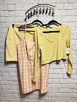 All three BP garments on hangers