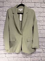 Full front view of blazer on hanger showing color, style and tags