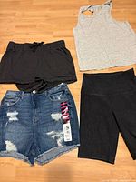 Group shot of all four clothing items laid flat