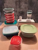 Group shot showing shelf riser, all plastic containers and lids