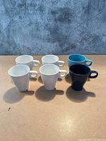 Six IKEA mugs upright showing color assortment