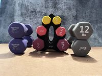 Front view of all dumbbell pairs and rack