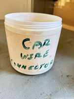 Exterior of plastic container labeled for wire connectors