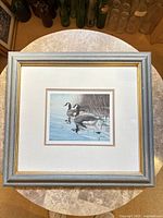 Front view showing artwork, mats and frame