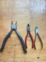 All three cutting pliers side by side for size comparison