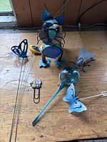all items grouped on tabletop showing scale and condition