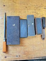 full view of five sharpening items laid out