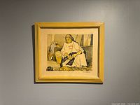 Framed lithograph on wall showing full artwork and frame