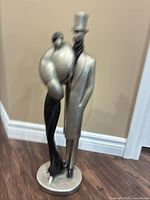 Full view of figurine showing overall form and finish