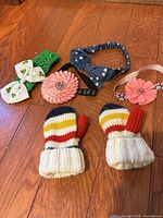 All items overview showing mittens and four headbands