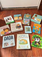 All 12 board books laid out on floor